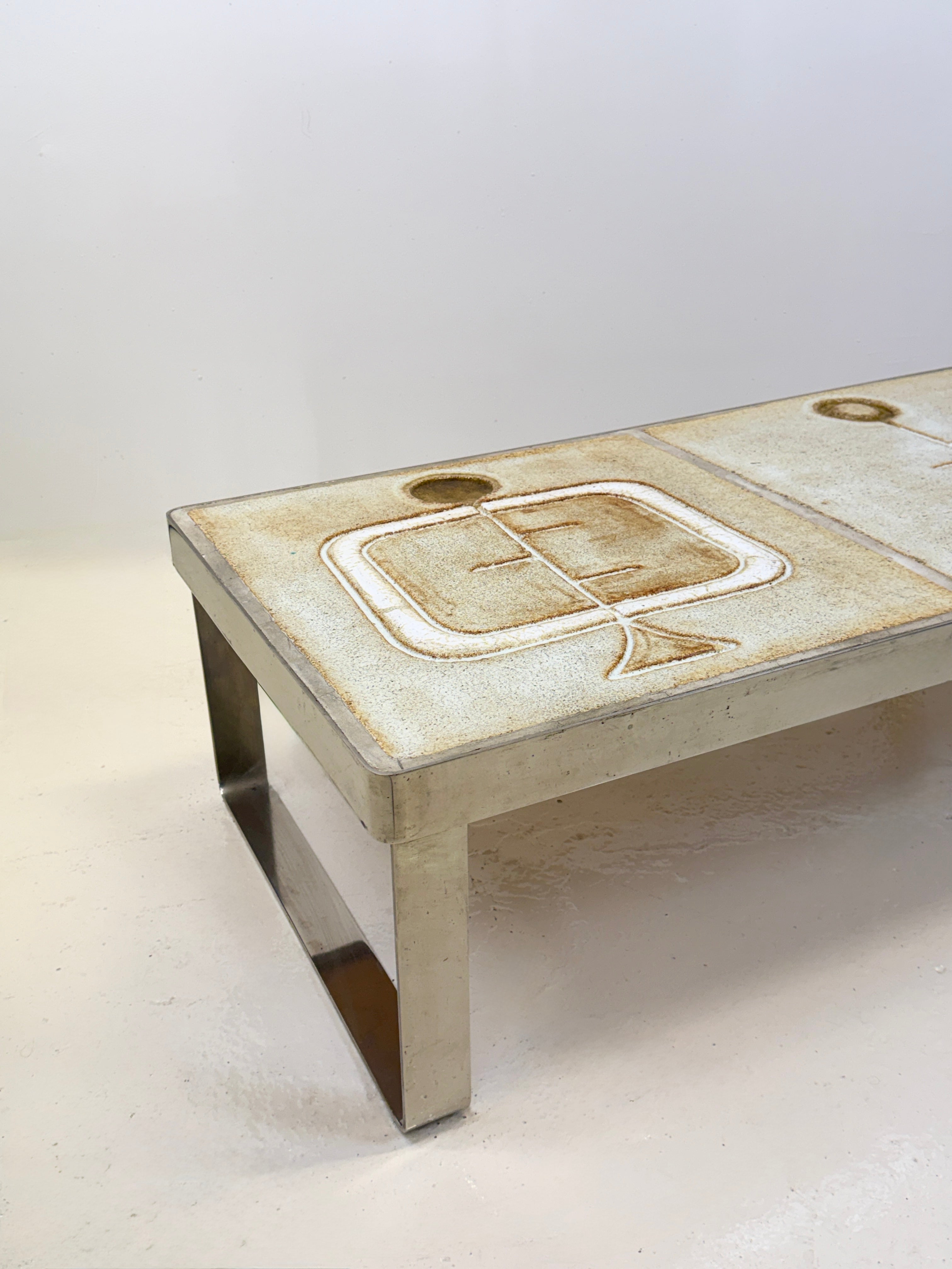 TABLE BASSE CÉRAMIQUE / CHROME — JEAN GREGORIEFF, FRANCE, 1970s