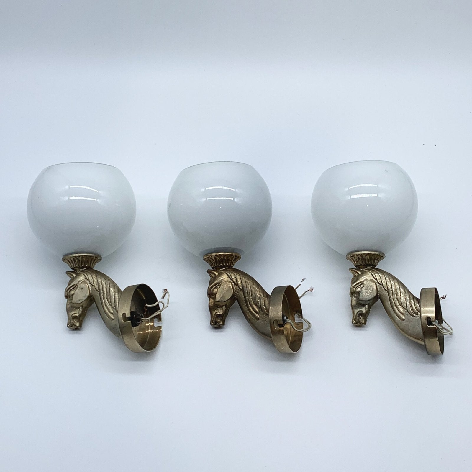 TRIO D'APPLIQUES À CHEVAL "HOLLYWOOD REGENCY" EN LAITON, 1950s